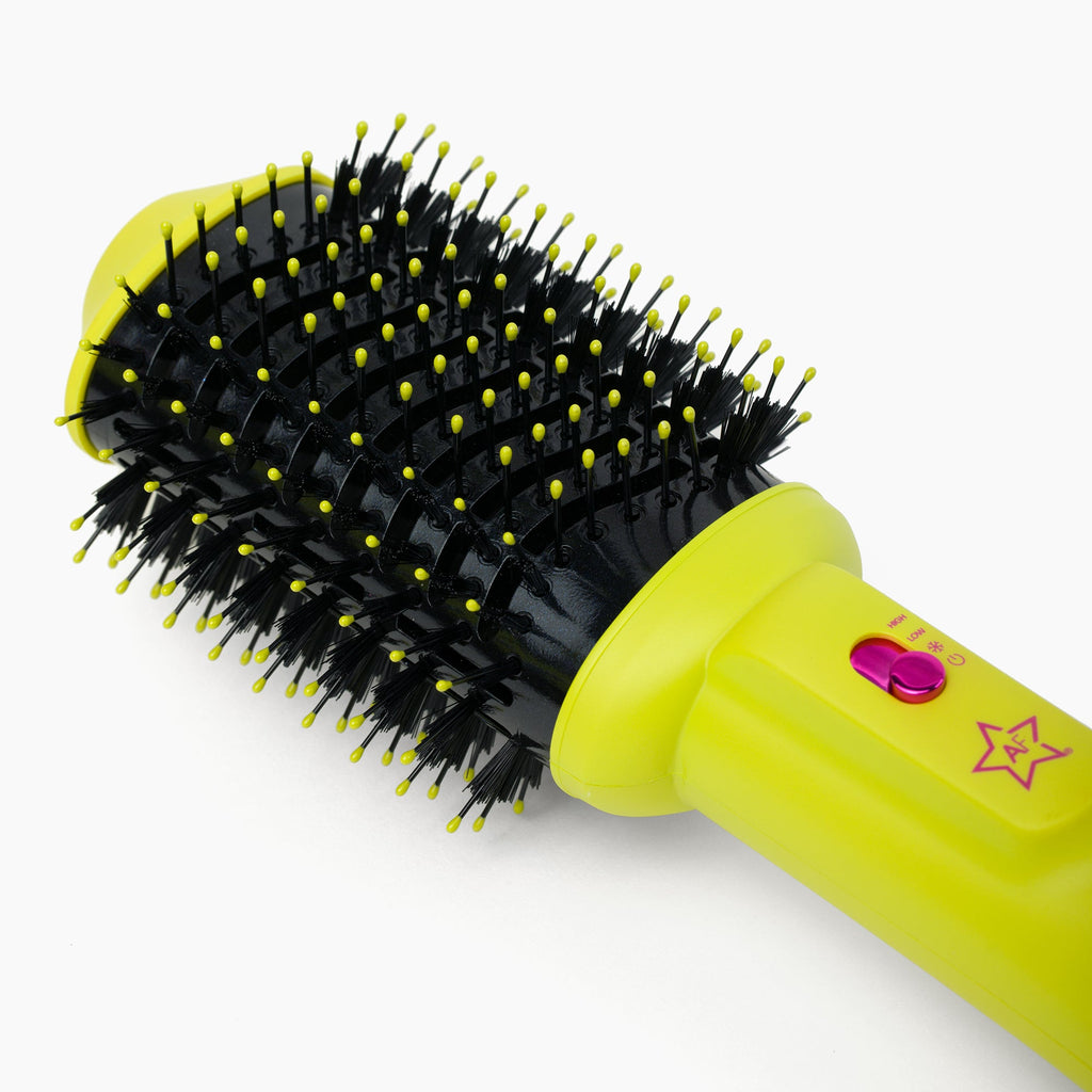 Close-up of yellow Almost Famous blowout brush styling head