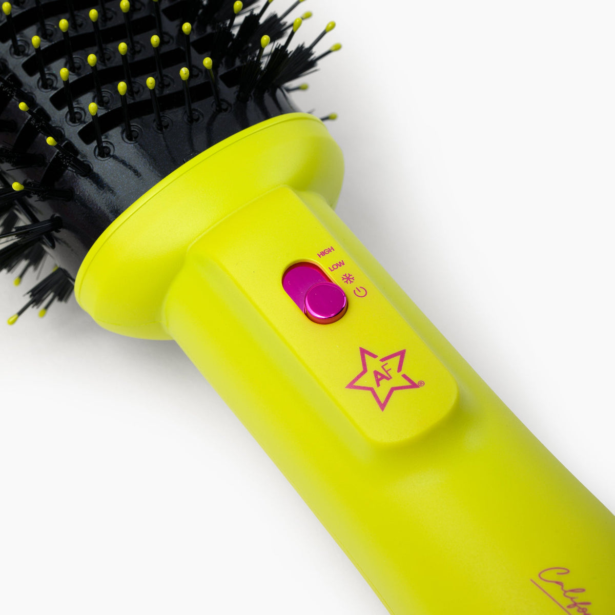 Almost Famous 3-in-1 blowout brush feature close-up